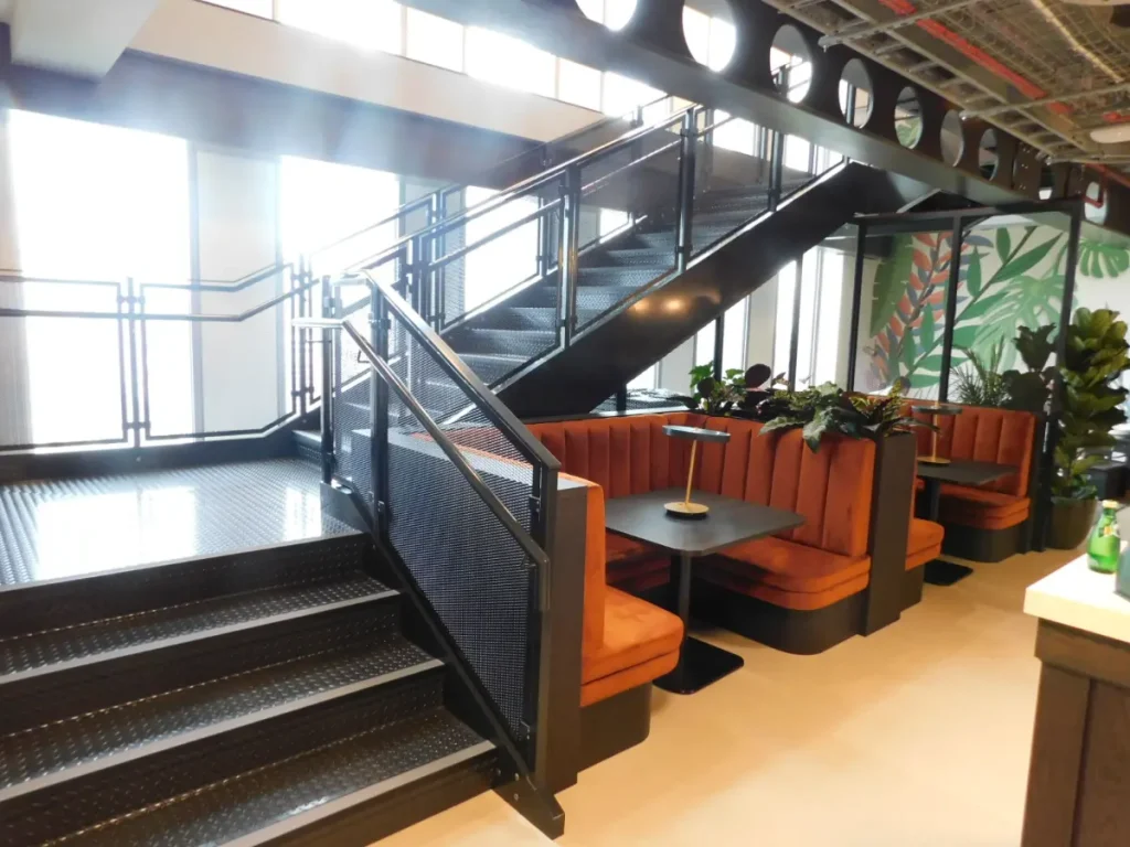 right angle metal staircase from below